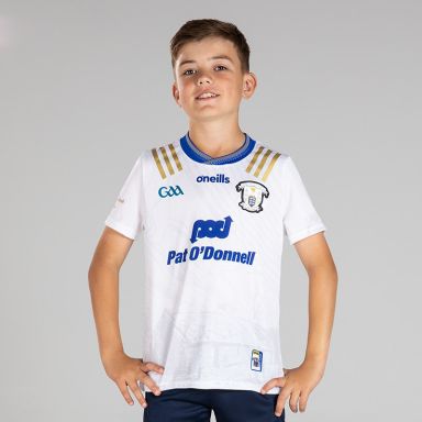 White Kids' Clare GAA Commemoration Jersey with Michael Cusack cottage on the front and image of Michael Cusack on the sleeve by O’Neills.