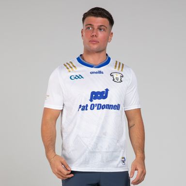 White Clare GAA Commemoration Jersey with Michael Cusack cottage on the front and image of Michael Cusack on the sleeve by O’Neills.