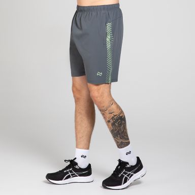 Grey Men’s Ignite Training Shorts with Green print design and two zip pockets by O’Neills.