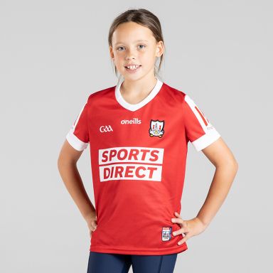 Red/White kids' Cork GAA Home Jersey with sponsor logos by O'Neills.