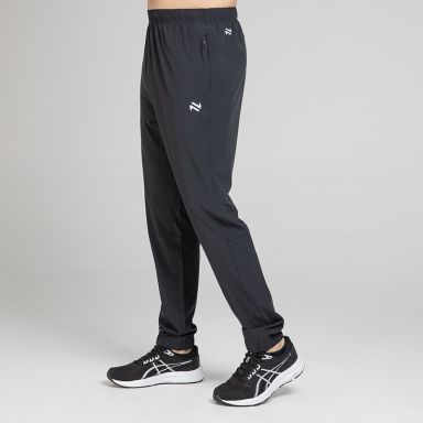 Black Men’s Horizon Woven Tracksuit bottoms with two zip pockets by O’Neills.