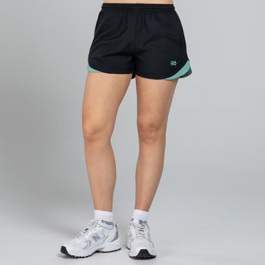Black Women’s Sports Shorts with a Green panel on the sides and an elasticated waistband by O’Neills.