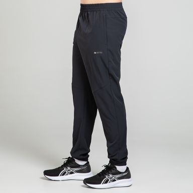 Black O’Neills Men’s Tempus Woven Tracksuit Bottoms with a drawcord waistband and zip pockets