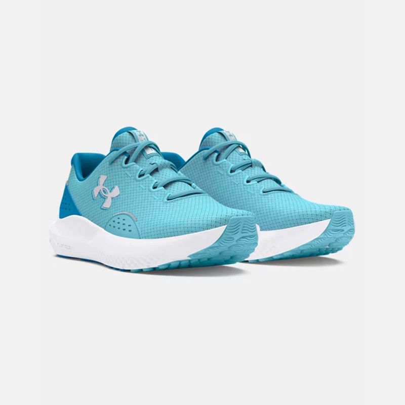 Women's blue and white Under Armour laced running shoes from O'Neills.