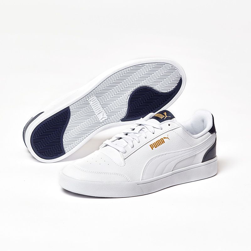 white and navy Puma men's sport style shoes with a lace closure and low boot silhouette from O'Neills