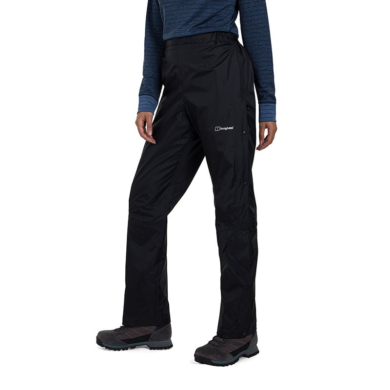 Black Berghaus women's Deluge overtrousers with waterproof protection from O'Neills.