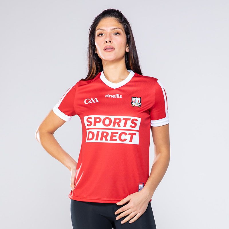 Red Women's Cork Home Jersey with striped detail on sleeves by O'Neills. 