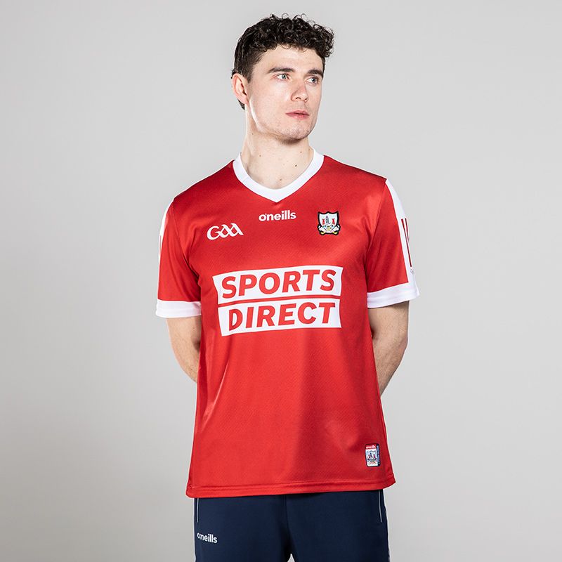 Red Men's Cork Home Jersey 2023 with 3 stripe detail on sleeves by O'Neills. 