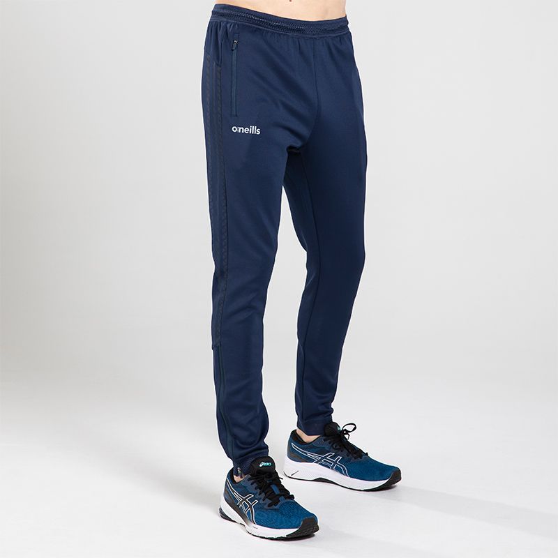 Navy Men's skinny tracksuit bottoms with zip pockets and stripe detail on the sides by O’Neills