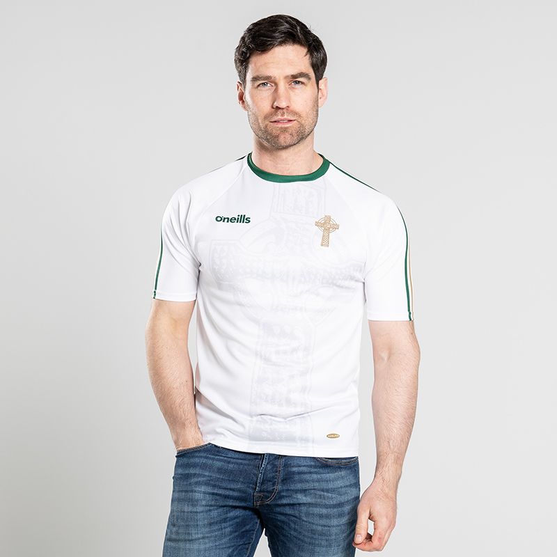 White Celtic Cross jersey with embroidered Celtic Cross on the chest and Celtic cross watermark design with the lettering ‘In Éirinn tá Neart’ on back by O’Neills. 