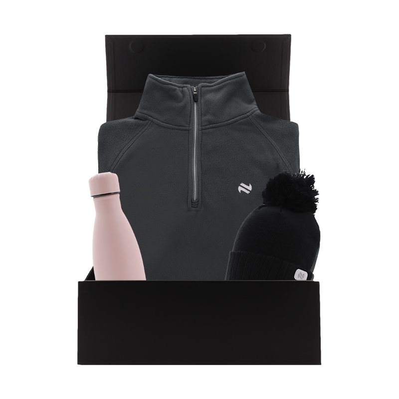 Women’s Winter Warmer Gift Box with a Grey Cairo Half Zip Fleece, Black Arc Bobble hat and Pink Tidal Water Bottle packaged in a gift box by O’Neills.