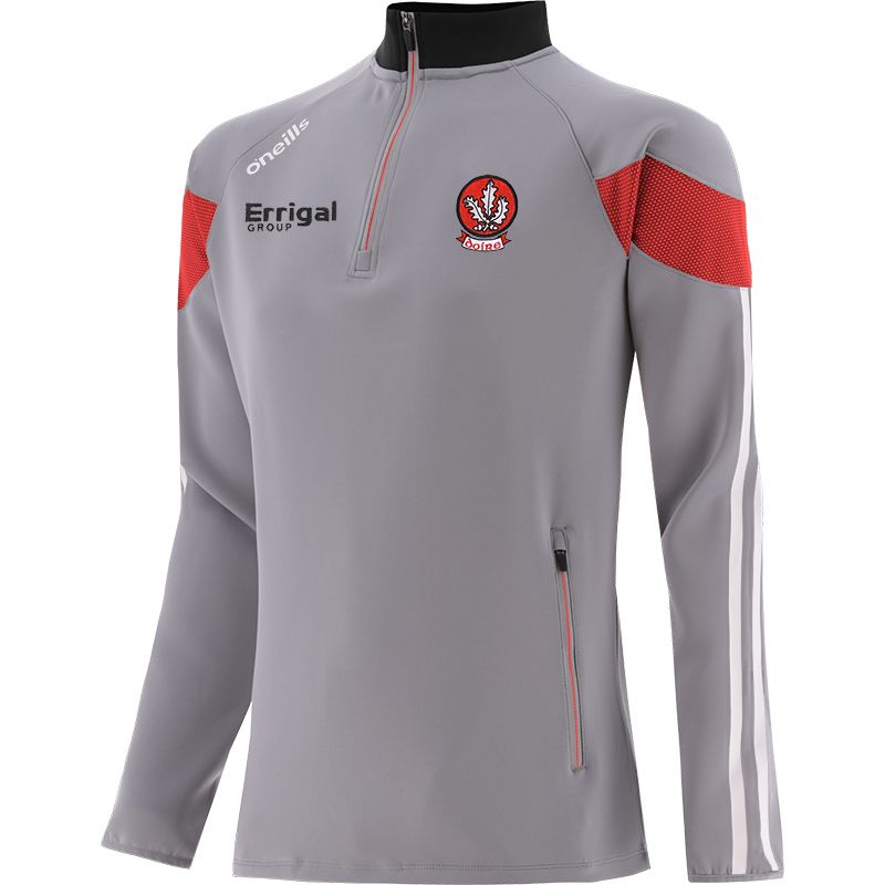 Kid's Derry Hybrid Half Zip Top with zip pockets and county crest by O’Neills. 