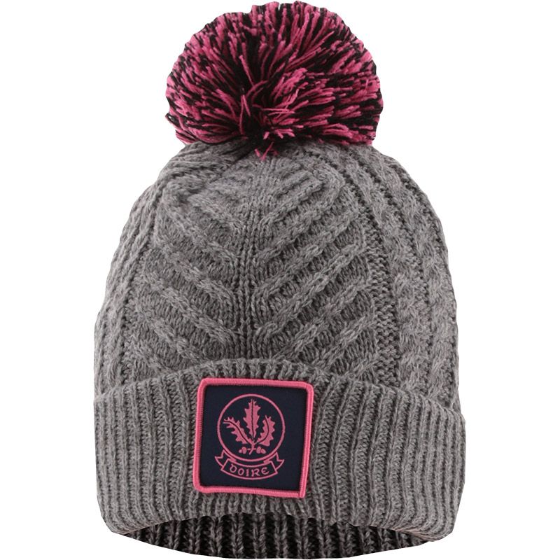 Grey and pink Derry GAA Ruby Bobble Hat Grey with county crest by O’Neills.