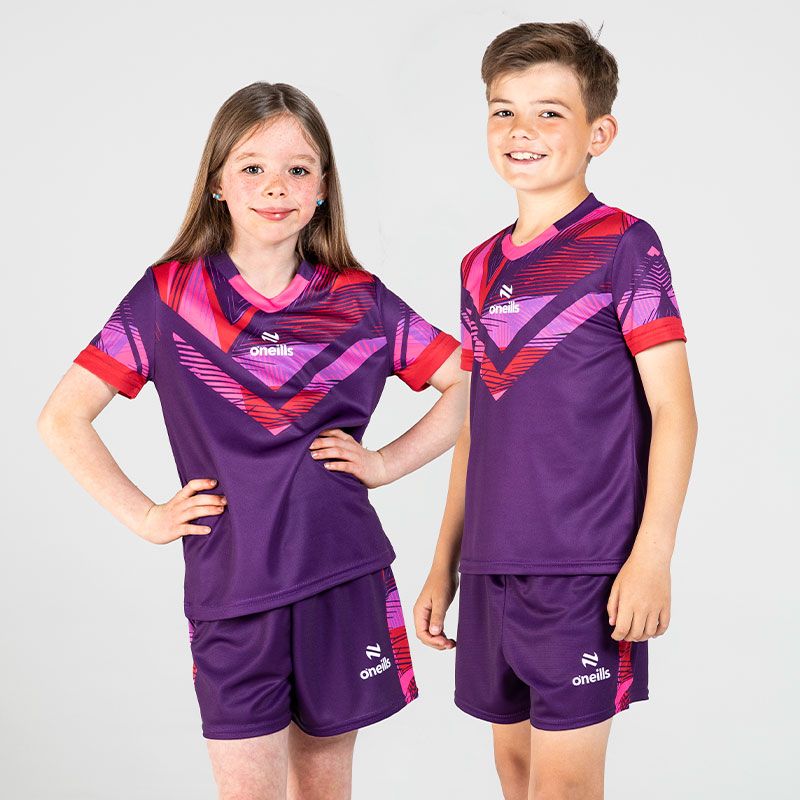 Purple / Red / Pink Kids’ Volt Summer Sets with matching jersey and shorts by O’Neills.